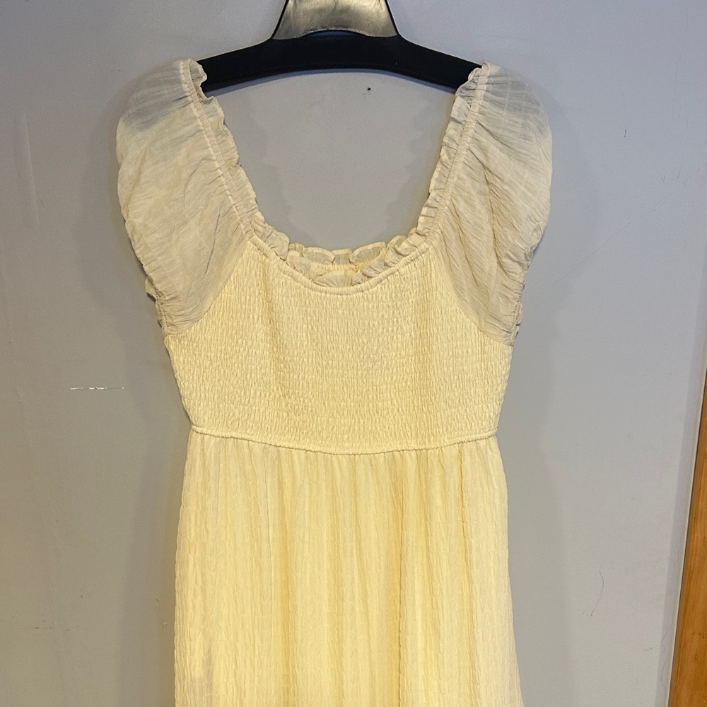 Elegant Cream Midi Dress with Ruffled Sleeves